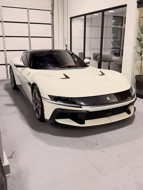 White sports car with dark window tint